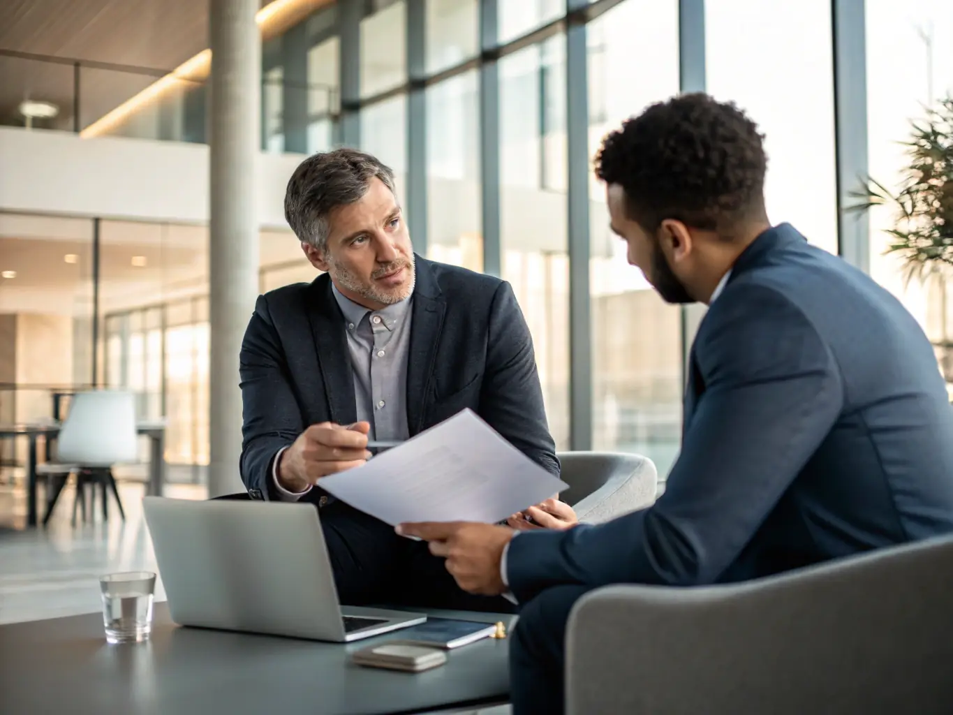 An image featuring a successful client shaking hands with an AMID Investment advisor, symbolizing the company's commitment to client success.